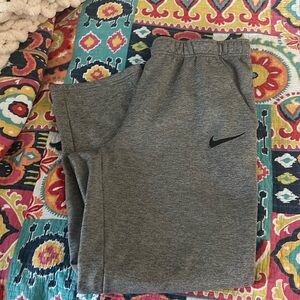 Nike men’s drifit thermal pants in gray with pockets and drawstring in Large
